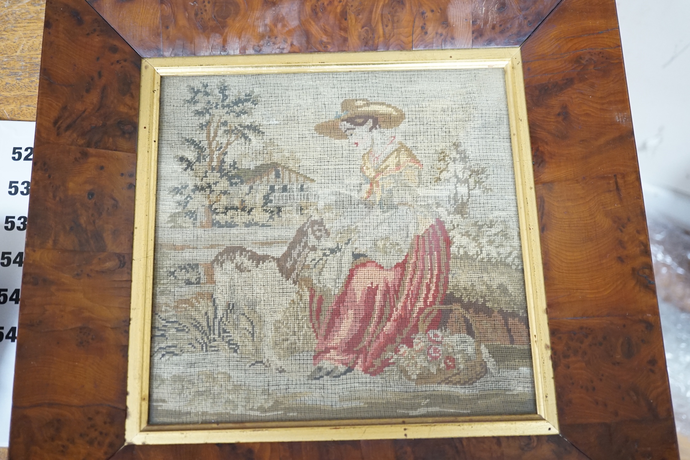 Two mid 19th century embroideries; a framed sampler dated 1809 and an embroidered figurative panel, largest 114 x 42cm. Condition - poor